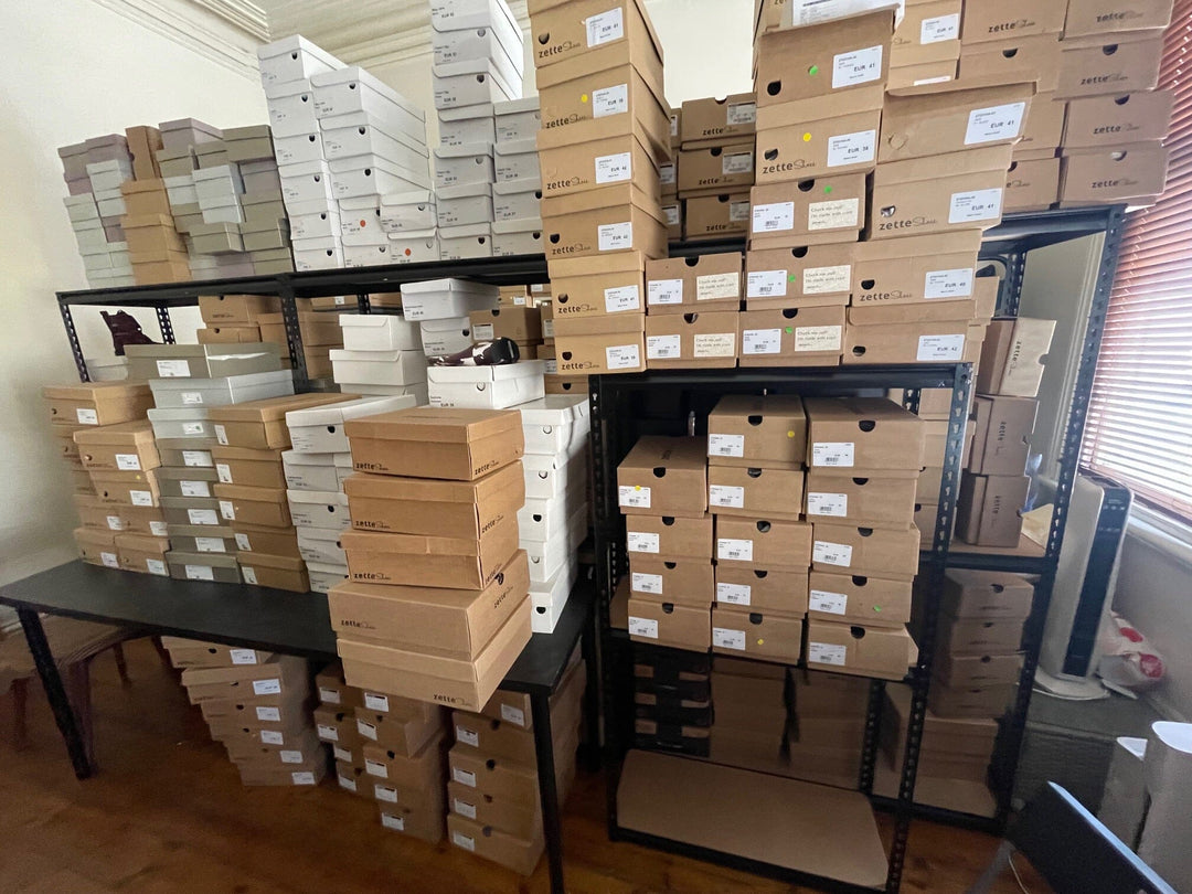 Boxes and various brands of vegan footwear stored above the old Vegan Style store on Brunswick St, Fitzroy.