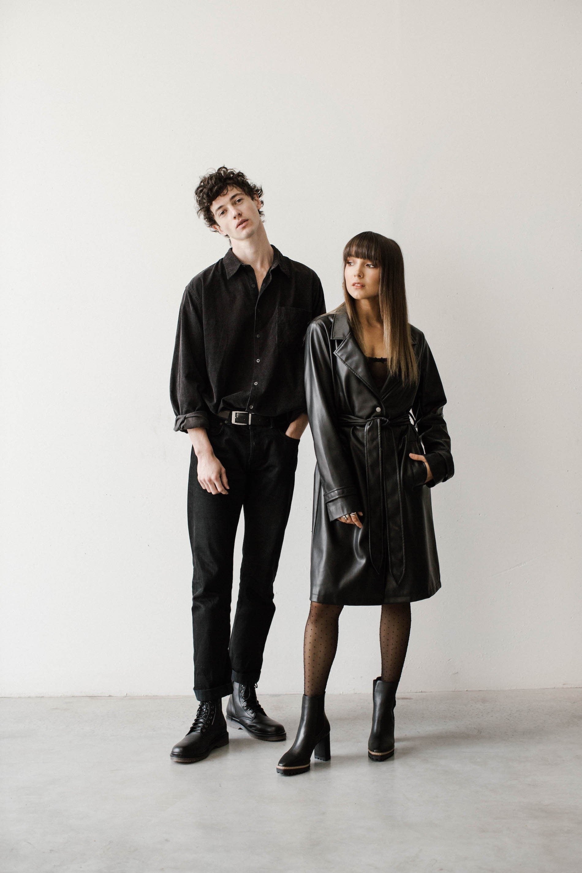 Male and female model dressed in all black wearing vegan boots from the latest Zette Winter Collection