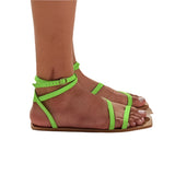 Flat vegan sandal by Arenaria - green