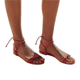 Flat vegan toe-strap sandal by Arenaria - red